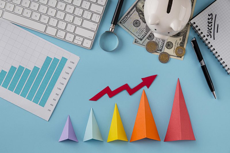 top-view-business-items-with-growth-chart-colored-cones copy
